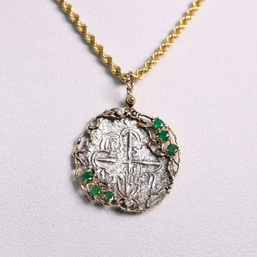 8 REALE WITH EMERALDS MEL FISHER COIN